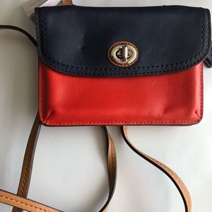 Blue and orange coach wallet with shoulder strap